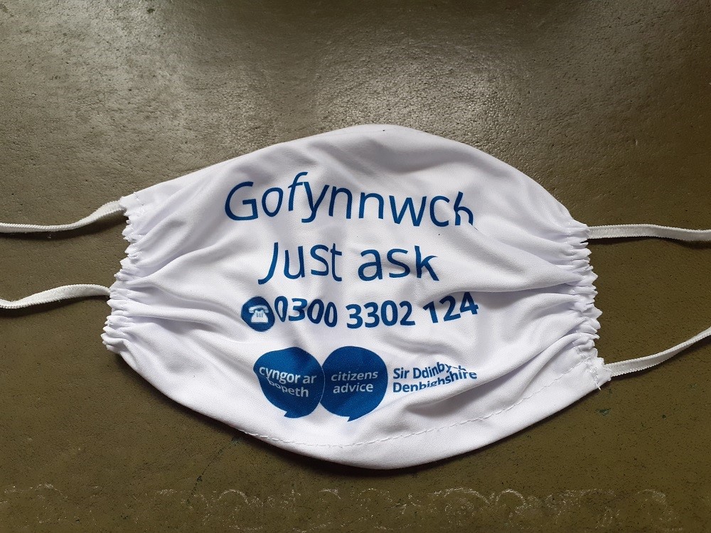 masg CAB gyda slogan Gofynnwch - Just Ask